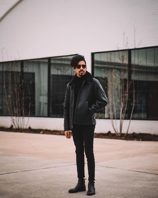 Schwarzen Rollkragenpullover kombinieren – 500+ Herren Outfits kalt Wetter: Paaren Sie einen schwarzen Rollkragenpullover mit schwarzen engen Jeans für ein großartiges Wochenend-Outfit. Fühlen Sie sich mutig? Komplettieren Sie Ihr Outfit mit schwarzen Chelsea Boots aus Leder.