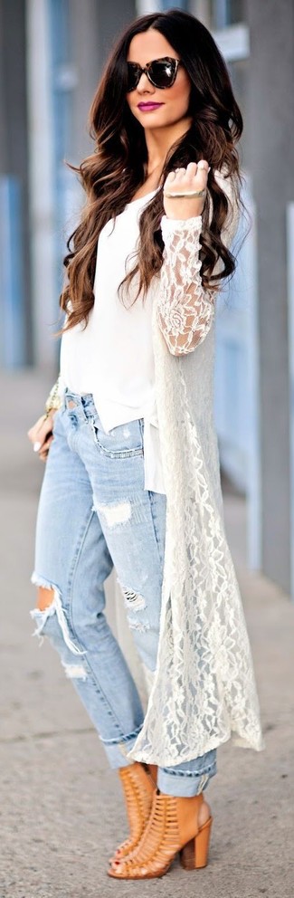 Wie hellblaue Jeans mit brauner Leder Stiefeletten zu kombinieren – 9 Damen Outfits