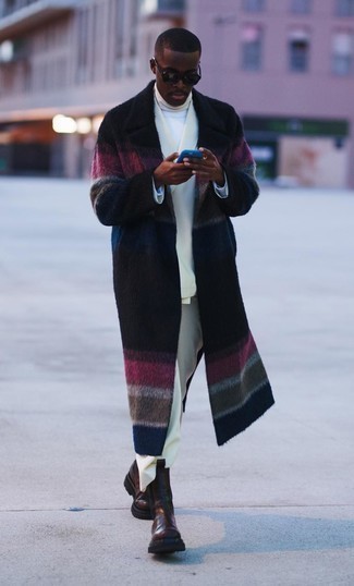 Wie Rollkragenpullover mit Anzuges zu kombinieren – 119 Elegante Herren Outfits kalt Wetter: Machen Sie sich mit einem Anzug und einem Rollkragenpullover einen verfeinerten, eleganten Stil zu Nutze. Ergänzen Sie Ihr Look mit dunkelbraunen Chelsea Boots aus Leder.