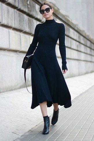 Dunkelblaues Midikleid kombinieren – 42 Damen Outfits: Tragen Sie ein dunkelblaues Midikleid, um vor Casual-Perfektion zu strotzen. Schwarze Leder Stiefeletten sind eine ideale Wahl, um dieses Outfit zu vervollständigen.