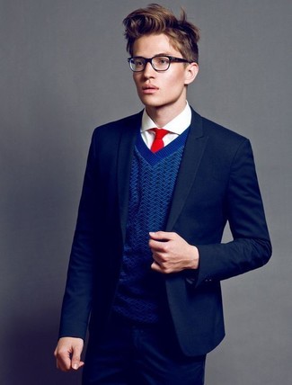 Dunkelblauen Pullover mit einem V-Ausschnitt kombinieren – 143 Herren Outfits: Ein dunkelblauer Pullover mit einem V-Ausschnitt und dunkelblaue enge Jeans sind eine perfekte Wochenend-Kombination.