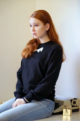 schwarzer und weißer bedruckter Pullover mit einem Rundhalsausschnitt von GUILD PRIME