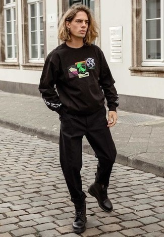 schwarzes bedrucktes Langarmshirt von Moschino
