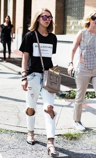 schwarzes und weißes bedrucktes T-Shirt mit einem Rundhalsausschnitt von DKNY