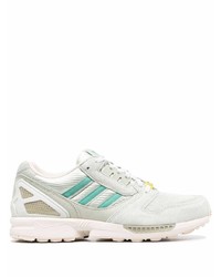 mintgrüne Sportschuhe von adidas