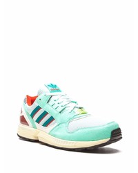 mintgrüne Sportschuhe von adidas