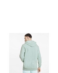 mintgrüner bedruckter Pullover mit einem Kapuze von Puma