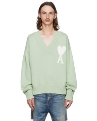 mintgrüner bedruckter Pullover mit einem V-Ausschnitt