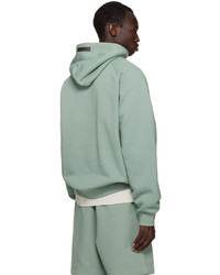 mintgrüner Pullover mit einem Kapuze von Essentials