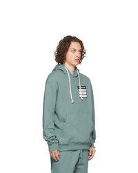 mintgrüner Pullover mit einem Kapuze von Maison Margiela