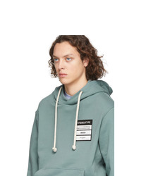 mintgrüner Pullover mit einem Kapuze von Maison Margiela