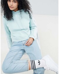 mintgrüner Pullover mit einer Kapuze von adidas