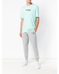 mintgrünes bedrucktes T-Shirt mit einem Rundhalsausschnitt von adidas