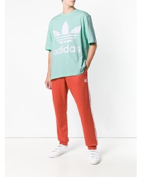 mintgrünes bedrucktes T-Shirt mit einem Rundhalsausschnitt von adidas