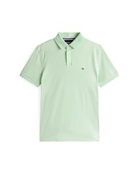 mintgrünes Polohemd von Tommy Hilfiger