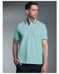 mintgrünes Polohemd von Trigema
