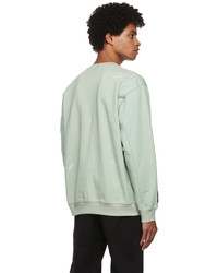 mintgrünes Sweatshirt von McQ