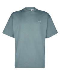 mintgrünes T-Shirt mit einem Rundhalsausschnitt von Nike