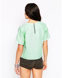 mintgrünes T-Shirt mit einem Rundhalsausschnitt von Motel