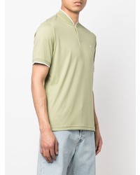 mintgrünes T-shirt mit einer Knopfleiste von Calvin Klein