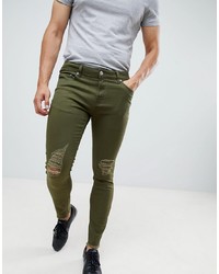 olivgrüne enge Jeans mit Destroyed-Effekten
