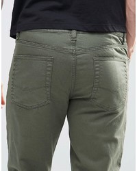 olivgrüne enge Jeans von Asos