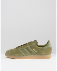 olivgrüne Turnschuhe von adidas