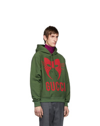 olivgrüner bedruckter Pullover mit einem Kapuze von Gucci