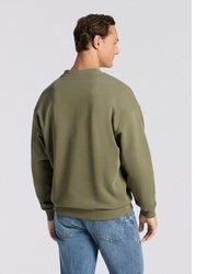 olivgrüner bedruckter Pullover mit einem Rundhalsausschnitt von HUGO Blue