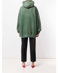 olivgrüner bedruckter Pullover mit einer Kapuze von Balenciaga