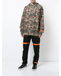 olivgrüner Camouflage Pullover mit einem Kapuze von Heron Preston