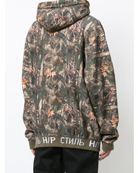 olivgrüner Camouflage Pullover mit einem Kapuze von Heron Preston