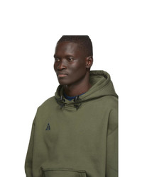 olivgrüner Pullover mit einem Kapuze von Nike