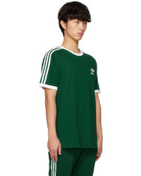 olivgrünes horizontal gestreiftes T-Shirt mit einem Rundhalsausschnitt von adidas Originals