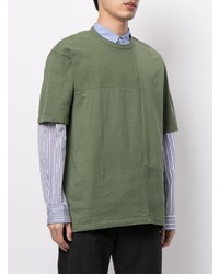 olivgrünes T-Shirt mit einem Rundhalsausschnitt mit Flicken von Comme des Garcons Homme