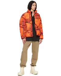 orange bedruckte Daunenjacke von The Very Warm