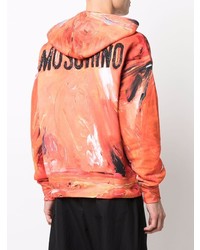 orange bedruckter Pullover mit einem Kapuze von Moschino