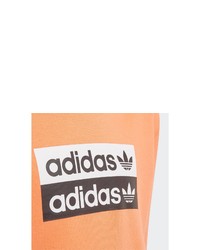 orange bedruckter Pullover mit einem Kapuze von adidas Originals