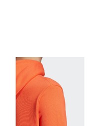 orange bedruckter Pullover mit einem Kapuze von adidas Originals