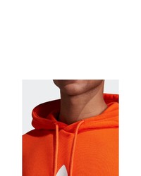 orange bedruckter Pullover mit einem Kapuze von adidas Originals