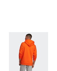 orange bedruckter Pullover mit einem Kapuze von adidas Originals