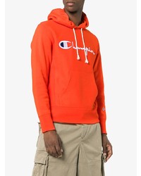 orange bedruckter Pullover mit einem Kapuze von Champion