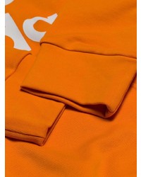 orange bedruckter Pullover mit einem Kapuze von adidas