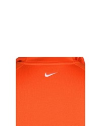 orange bedruckter Pullover mit einem Kapuze von Nike Sportswear