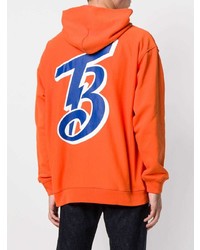 orange bedruckter Pullover mit einem Kapuze von Champion