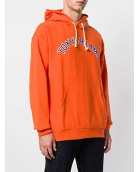 orange bedruckter Pullover mit einem Kapuze von Champion