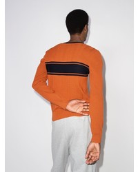 orange bedruckter Pullover mit einem V-Ausschnitt von adidas