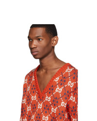 orange bedruckter Pullover mit einem V-Ausschnitt von Gucci