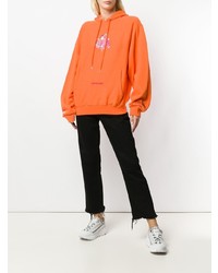 orange bedruckter Pullover mit einer Kapuze von Heron Preston