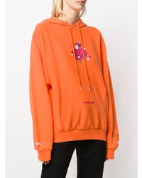 orange bedruckter Pullover mit einer Kapuze von Heron Preston